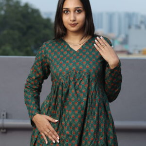 Deep green with small red motifs  flared kurti